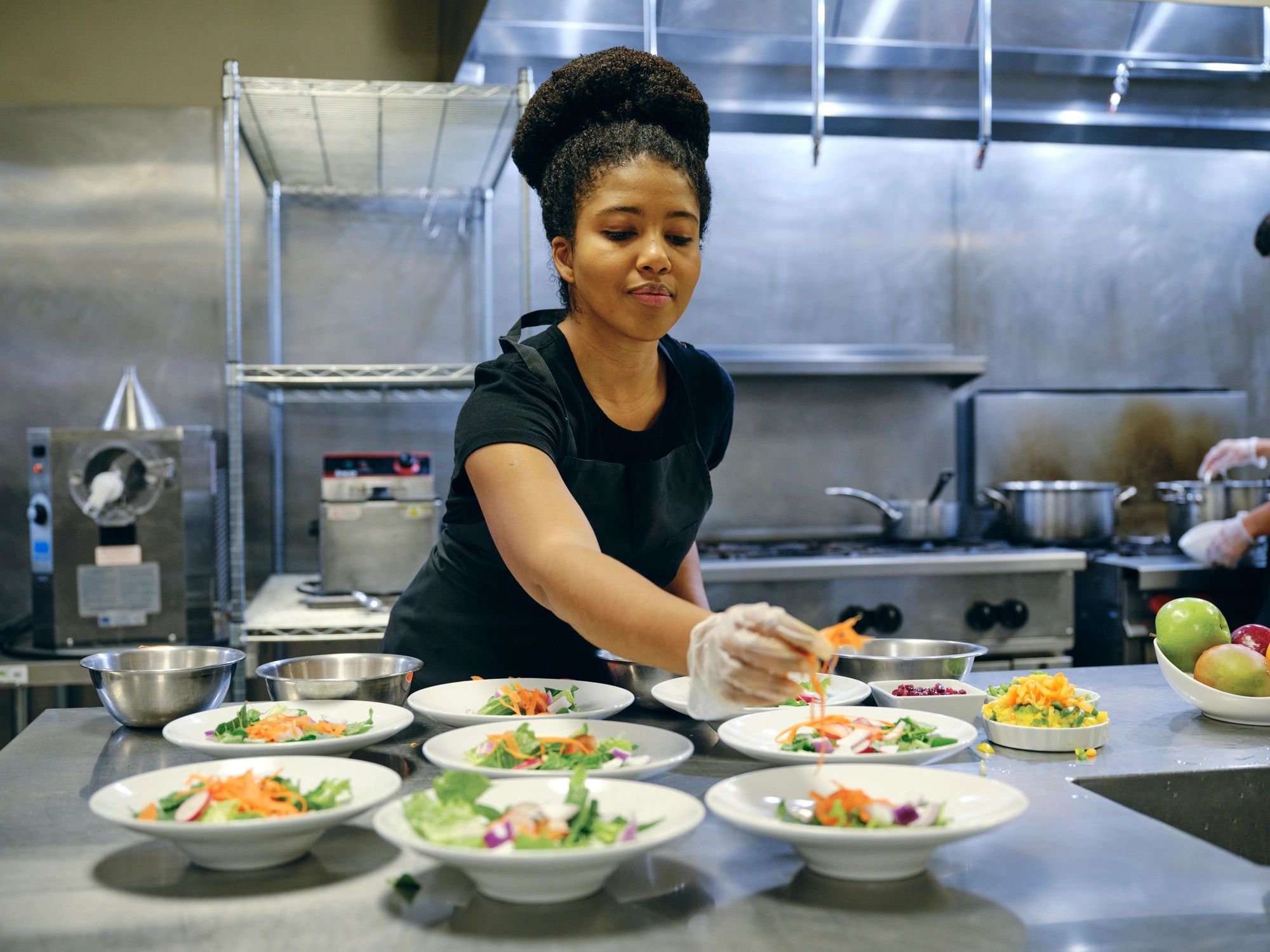 Chef preparing a gourmet meal in a luxury villa kitchen